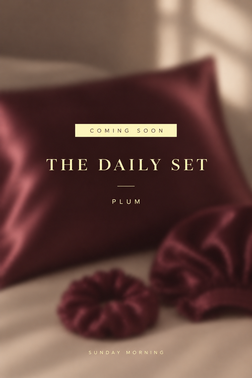 The Daily Set in plum satin — pillowcase, bonnet and scrunchie (coming soon poster)